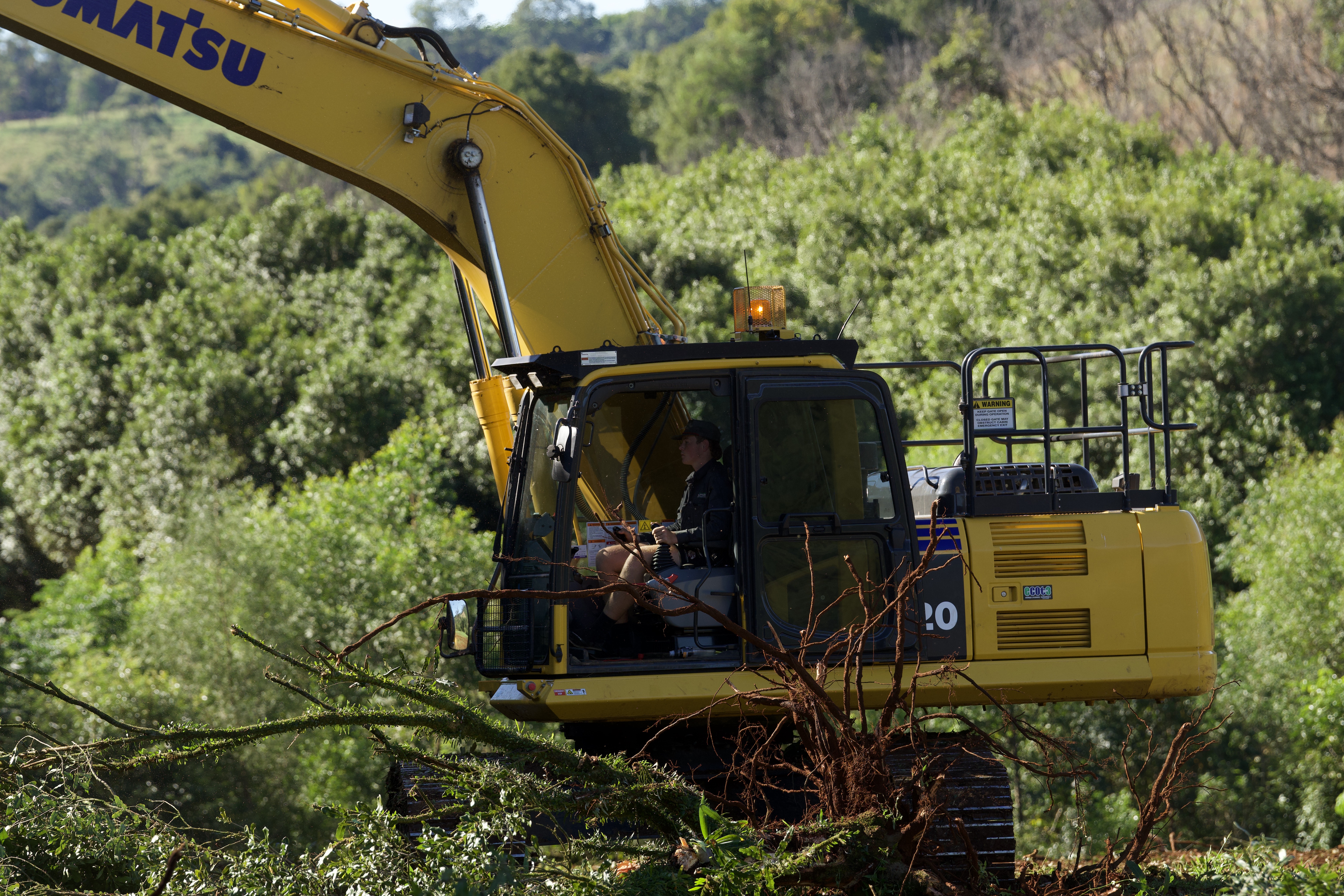 JMS Land Management excavator operator on site